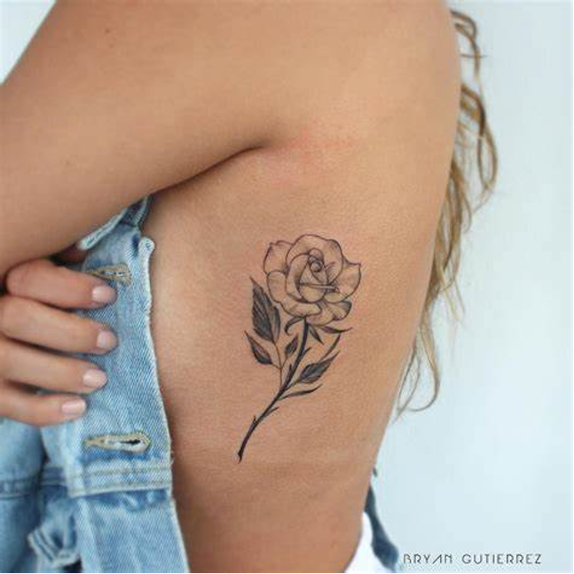 50 Rib Tattoos for Girls | Art and Design