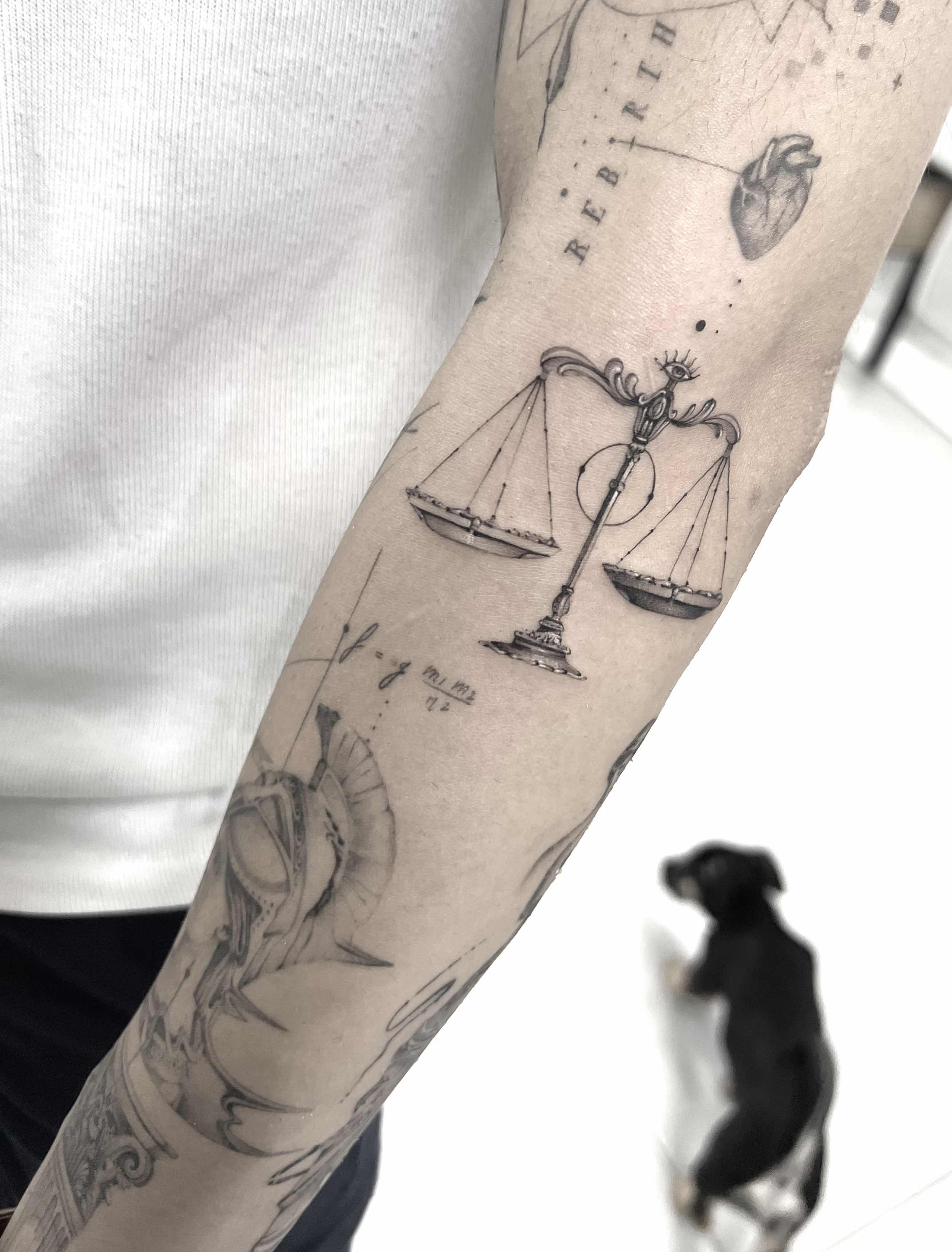 Libra Tattoo Ideas: Scales of Justice, Constellation, Wolves, & More
